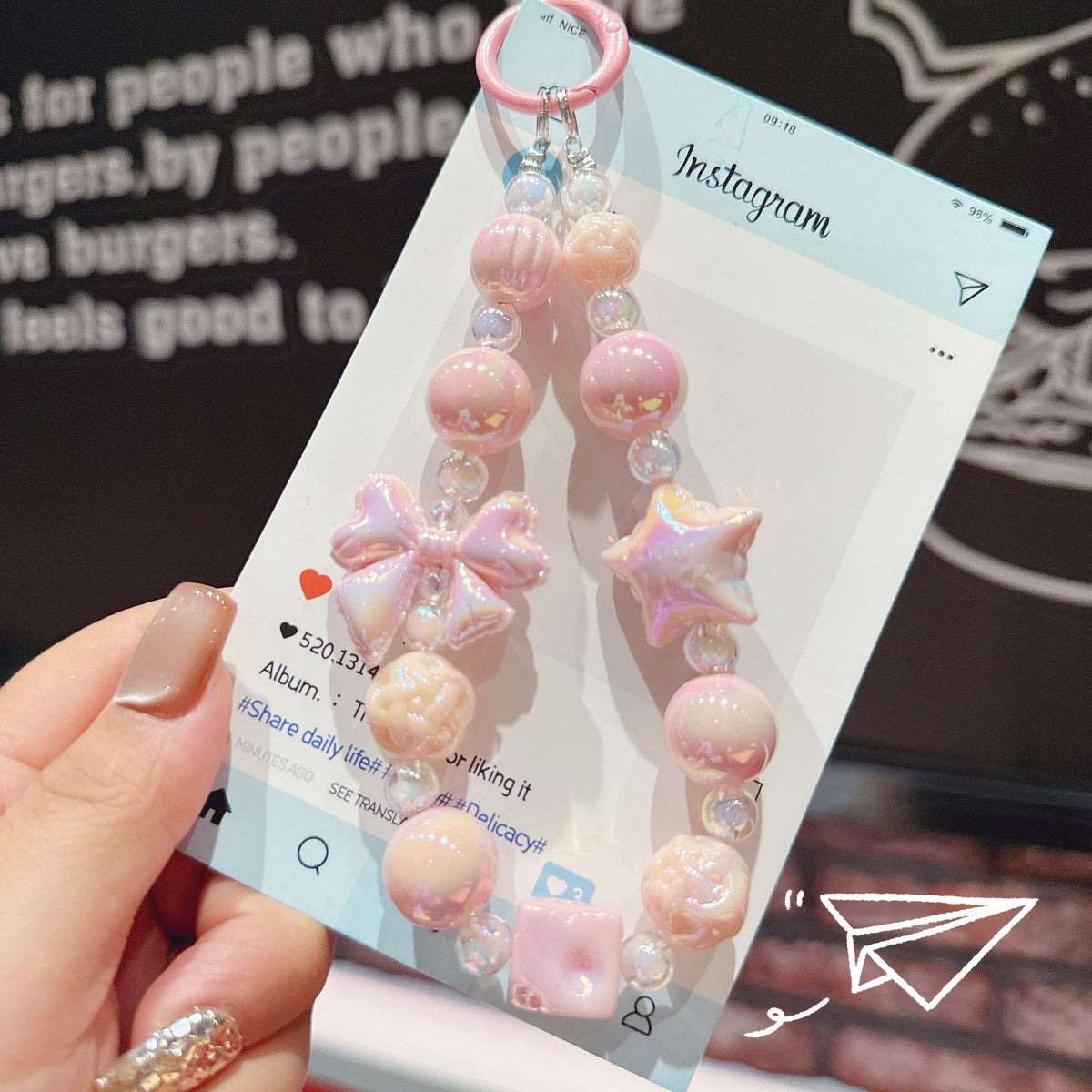 English: Iridescent Bow & Star Acrylic Phone Charm Strap