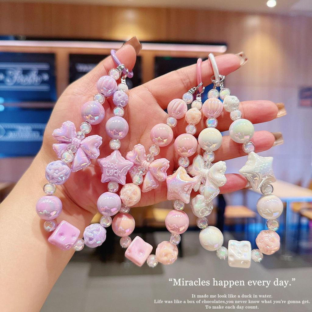 English: Iridescent Bow & Star Acrylic Phone Charm Strap