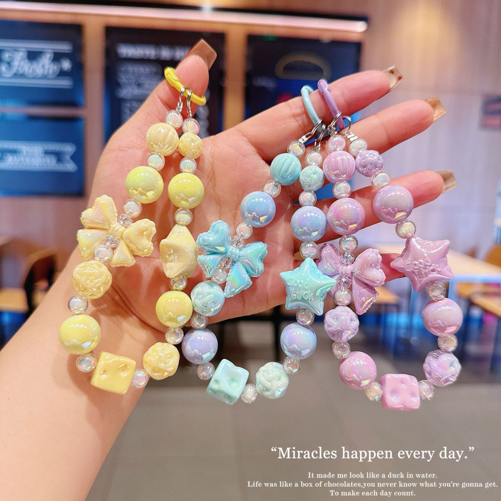 English: Iridescent Bow & Star Acrylic Phone Charm Strap