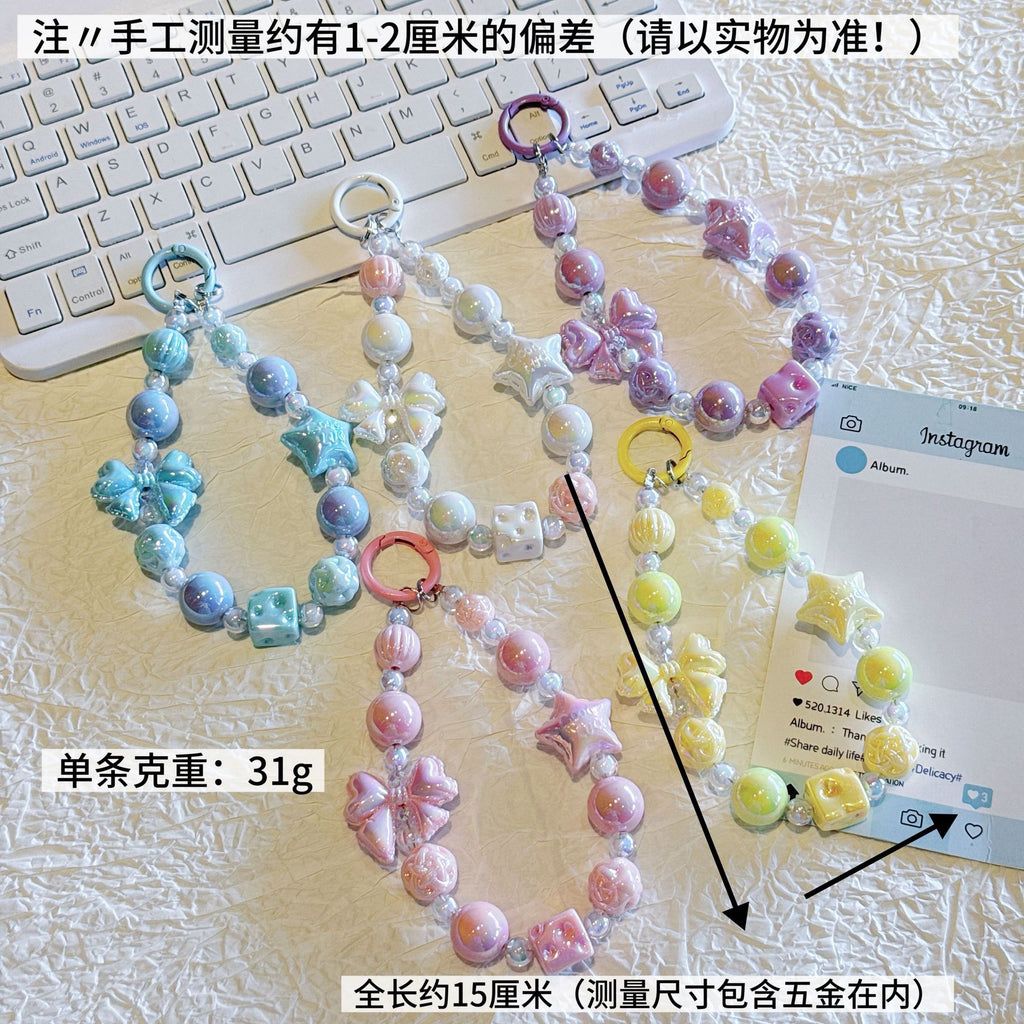 English: Iridescent Bow & Star Acrylic Phone Charm Strap